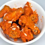 Buffalo Chicken Wings: A Spicy Dip into Flavorful History