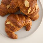 Almond Croissants Unwrapped: History, Flavor & Baking Tips